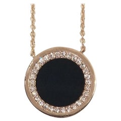 14 Karat Rose Gold Diamond and Black Onyx Halo Pendant