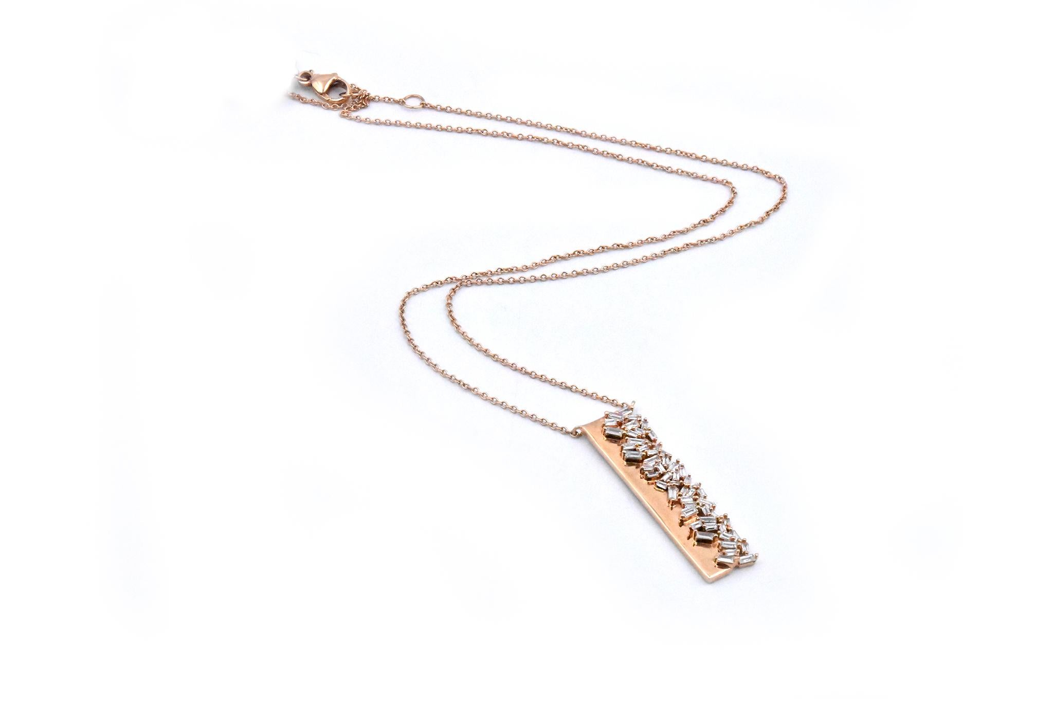 Designer: Custom
Material: 14K rose gold
Diamonds: 53 baguette cut = .56cttw
Color: G
Clarity: VS
Dimensions: necklace measures 18-inches in length with adjusters
Weight: 4.81 grams
