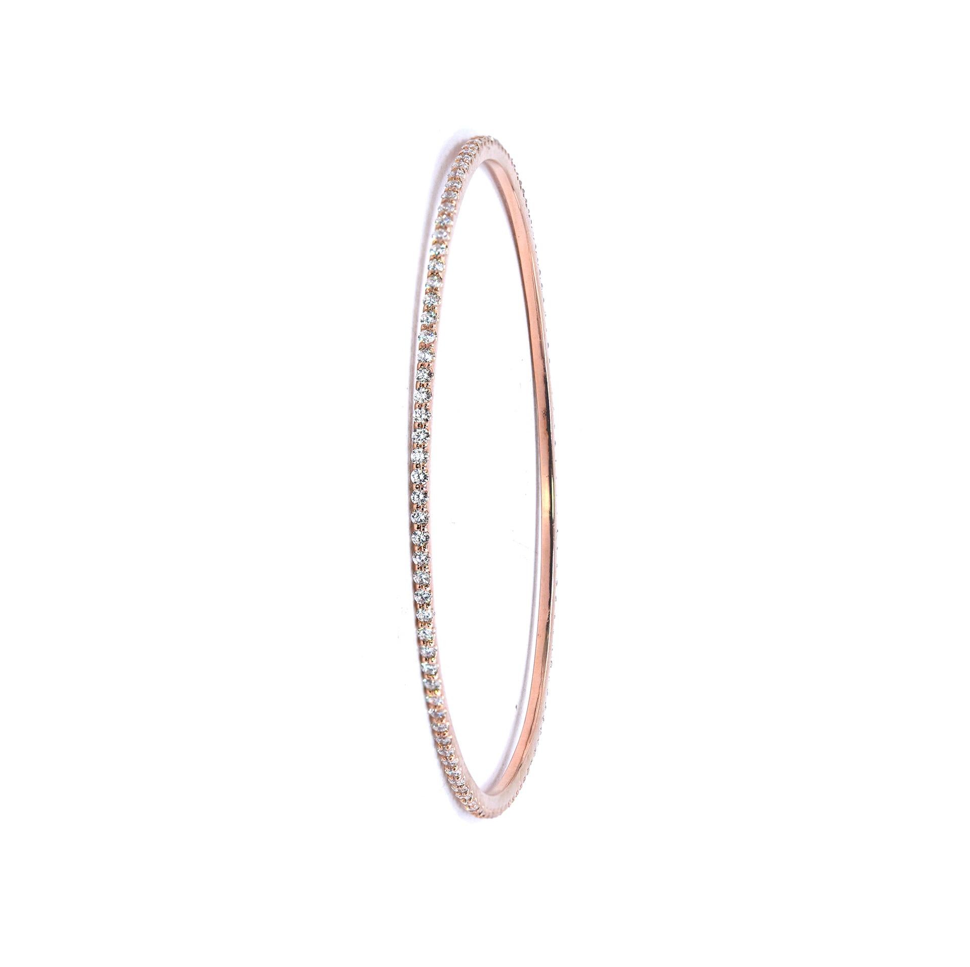 Designer: custom designed 
Material: 14K rose gold
Diamonds: 90 round brilliant cut = 1.80cttw
Color: G
Clarity: VS1
Dimensions: bracelet will fit a 8-inch wrist 
Weight: 7.69grams
