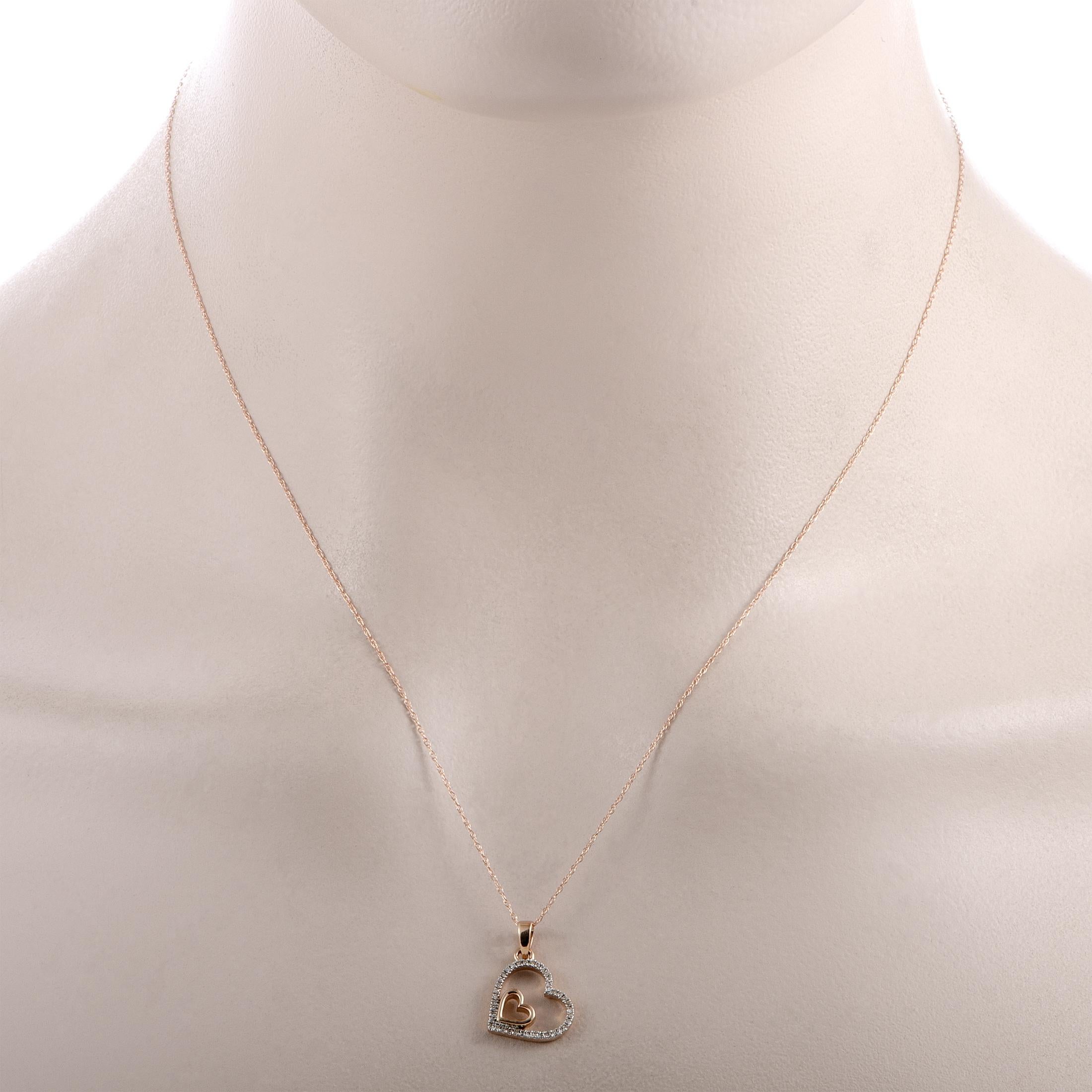 This necklace is crafted from 14K rose gold, boasting an 18.00” chain with spring ring closure and a heart pendant that measures 0.75” by 0.50”. The necklace weighs 1.7 grams and is set with a total of 0.08 carats of diamonds.
 
 Offered in brand
