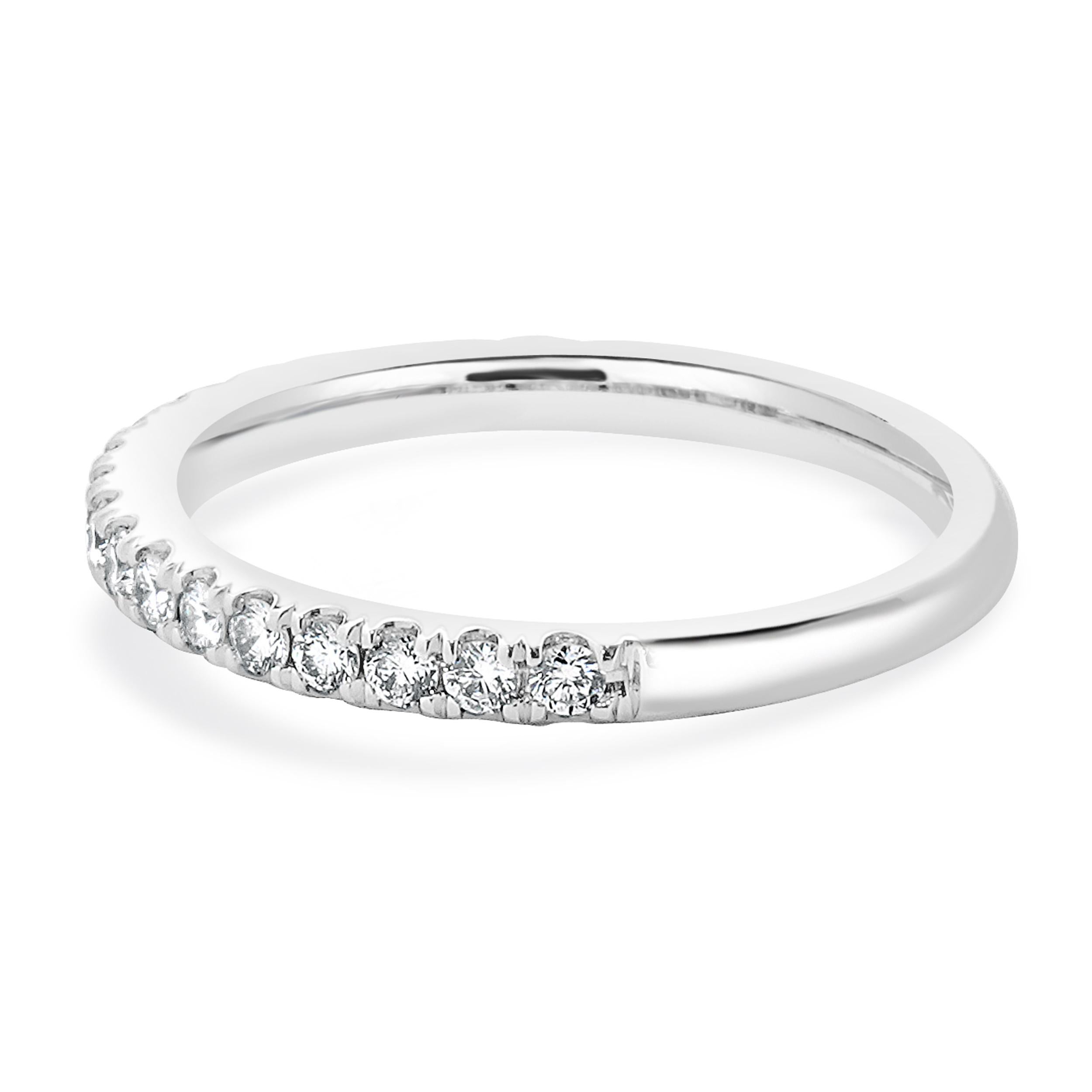 Designer: custom
Material: 14K white gold
Diamond: 19 round brilliant cut = 0.20cttw
Color: F
Clarity: SI1
Ring size: 4 (please allow two additional shipping days for sizing requests)
Weight: 1.56 grams
