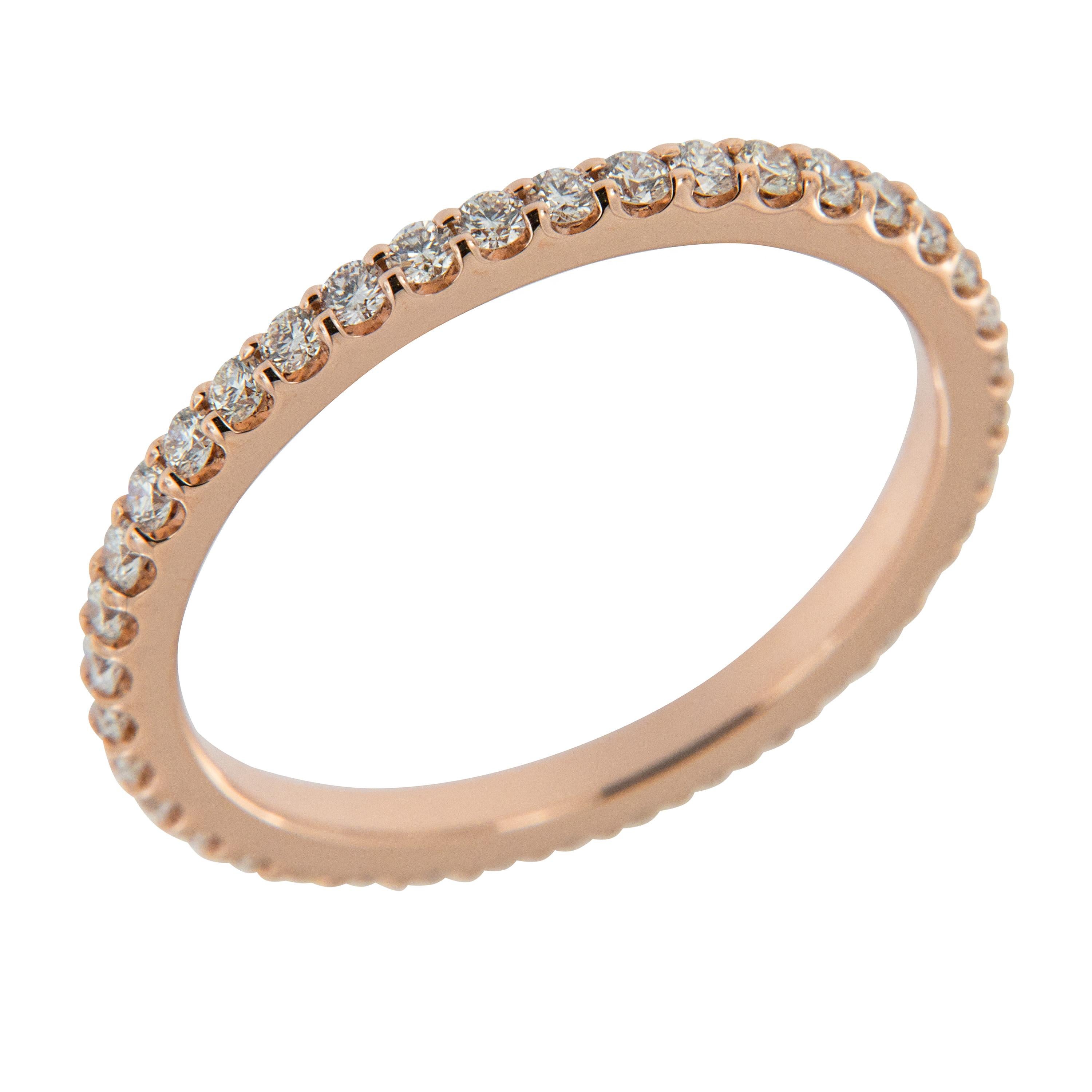 One of the most popular requests we get is for this ring! Soft hued, 14 karat rose gold eternity band accented with 39 diamonds = 0.49 Cttw (G-H, SI) in a size 6. This ring looks fantastic alone & just as beautiful stacked with others! Can be custom