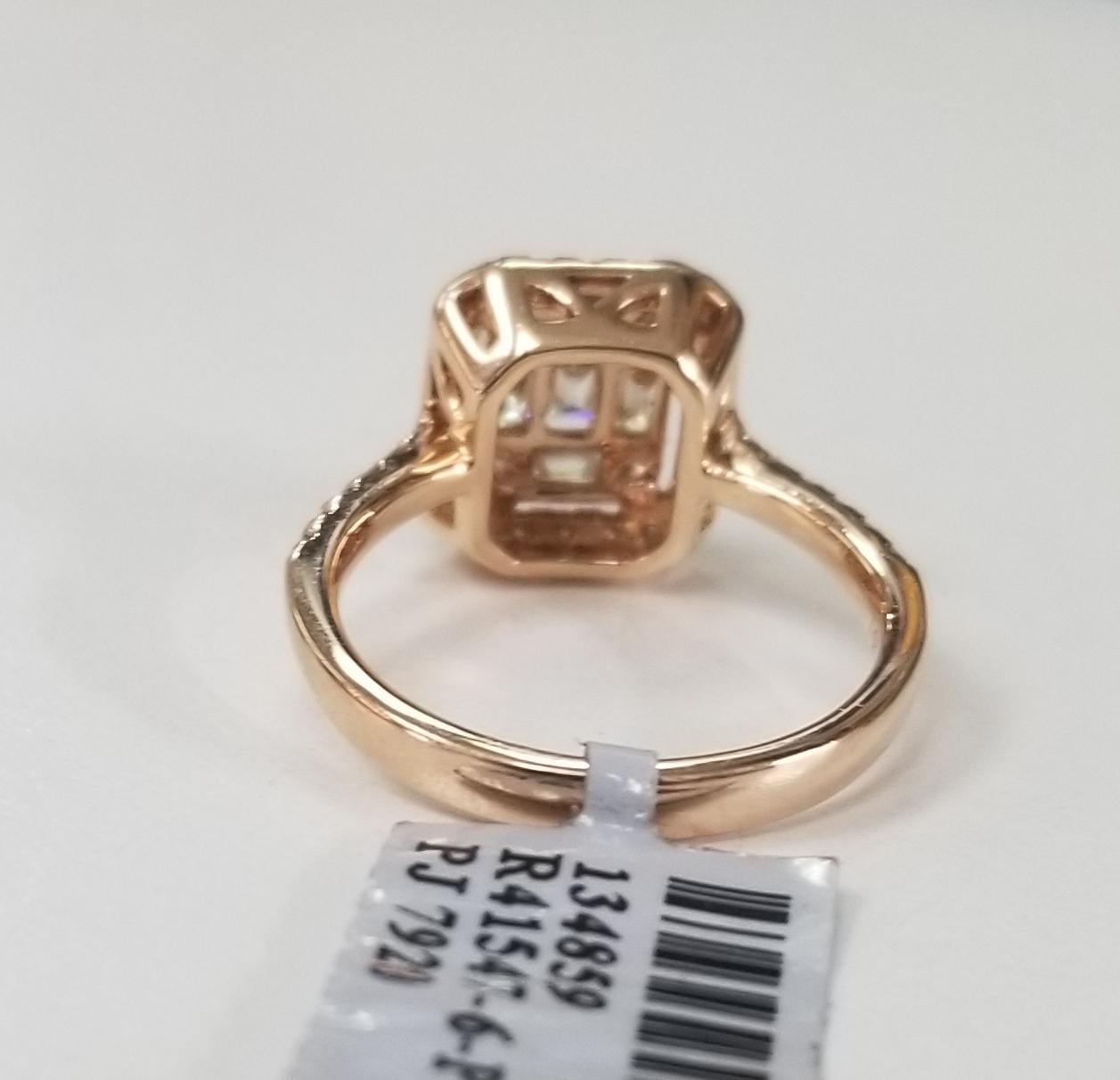 Round Cut 14 Karat Rose Gold Diamond Solitaire Halo Style Ring