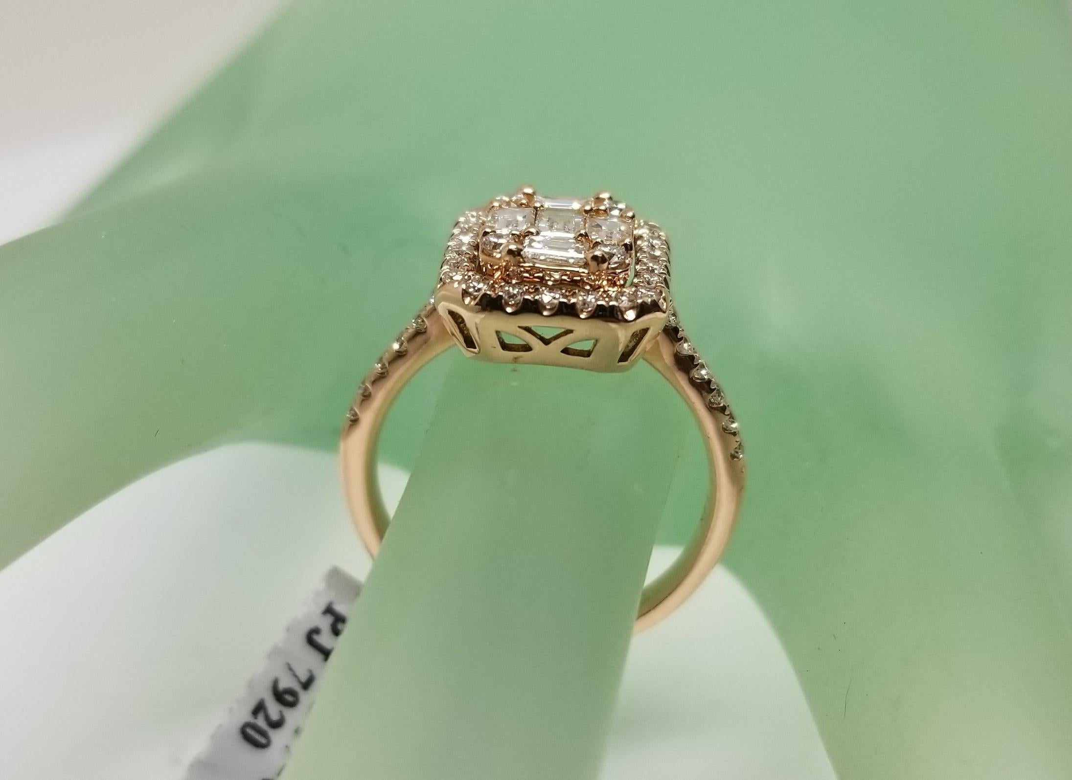 14 Karat Rose Gold Diamond Solitaire Halo Style Ring 1