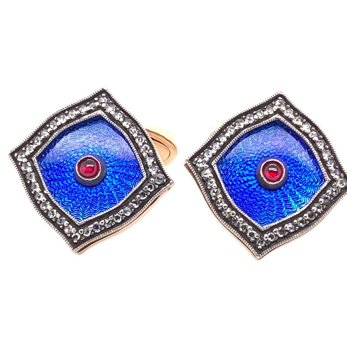 A set of cufflinks with so much style, suitable for the man or the woman of business. Fashioned from 14k rose gold they feature beautifully detailed guillouche enamel work which is highlighted by a subtle border of rose cut diamonds in silver. The