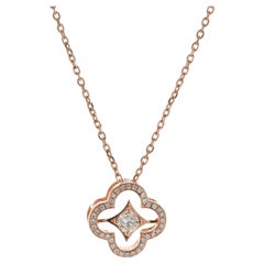 Collier fleur flottante en or rose 14 carats et diamants