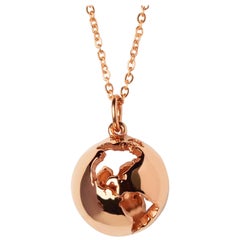 14 Karat Rose Gold Globe Map Pendant Necklace