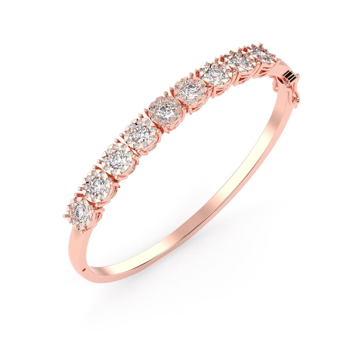 This diamond bangle showcases petite round diamonds Micro Prong-set in 14k rose gold for a total carat weight of 5.00 carats. The diamonds are set along the top half of this hinged bangle.

Product details: 

Center Gemstone Type: NATURAL