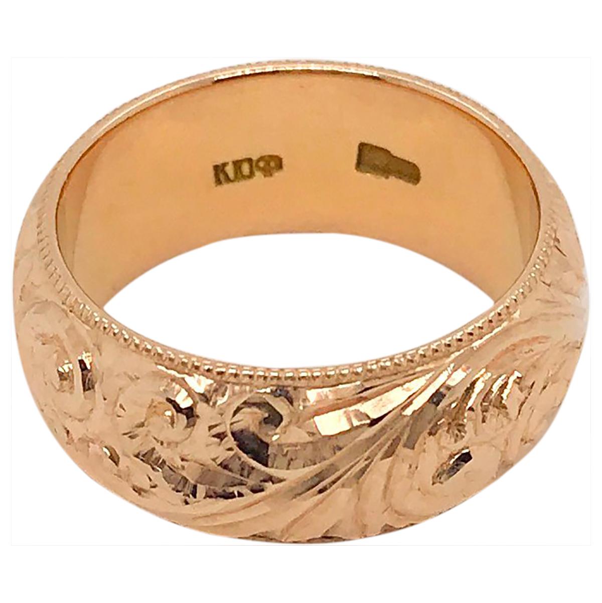 Don't you just love engraved bands? This one is exceptional, it's wide, weighty and looks gorgeous on it's own or stacked with other bands. Looks perfect with two narrow diamond bands either side as well. A beautiful pale rose gold with a soft pink