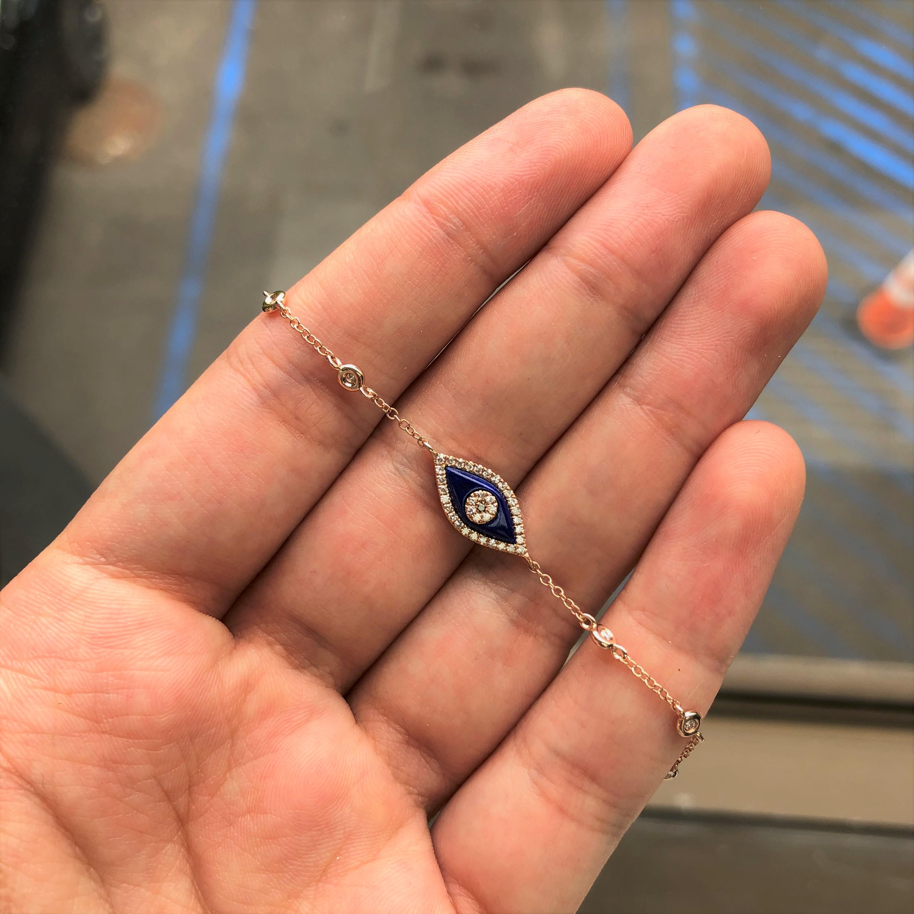 This is an adorable Lapis Evil Eye Bracelet. Crafted of 14K Rose Gold with approximately 0.19ct Round Sparkly Diamonds with the center of an eye being a black diamond. Diamond Color and Clarity GH-SI1-SI2.  This piece is perfect for everyday wear