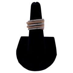 Bague en or rose 14 carats à diamants superposés