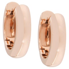Pendientes de aro mini Huggie de oro rosa de 14 quilates