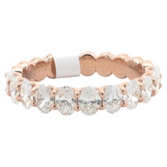 14 Karat Rose Gold Oval Cut Diamond Band 14 Karat Rose Gold Oval Cut Diamond Band