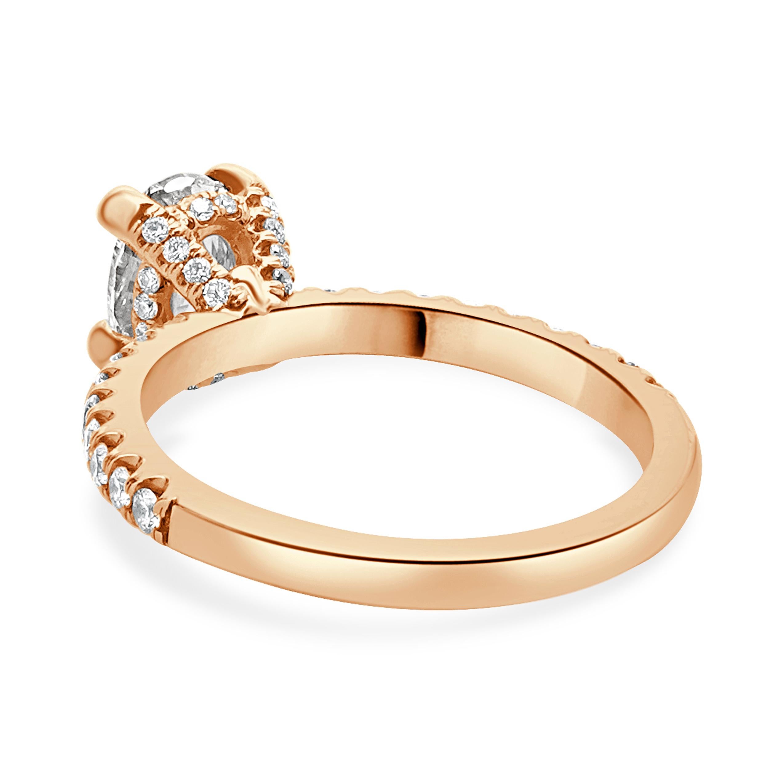 Designer: kundenspezifisch
MATERIAL: 14K Roségold
Diamant: 0,90cttw Oval
Farbe: F
Klarheit: VVS1
GIA: 6322380027          
Diamant: 44 runde Diamanten im Brillantschliff = 0,30cttw
Farbe: G
Klarheit: SI1
Ringgröße: 5 (bitte erlauben Sie zwei