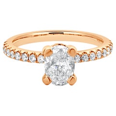 Used 14 Karat Rose Gold Oval Diamond Engagement Ring With Halo