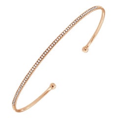 Petit bracelet jonc à manchettes en or rose 14 carats avec diamants (1/5 carat)