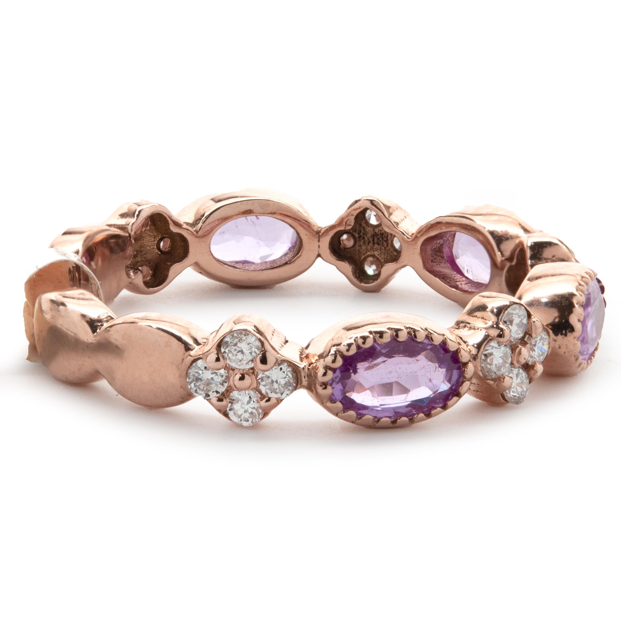 Designer: custom design
Material: 14K rose gold
Pink Sapphire: 4 oval cut = 1.05cttw
Diamond: 20 round brilliant cut = .27cttw
Color: G
Clarity: SI1
Dimensions: band measures 4.10mm wide
Ring Size: 7 (complimentary sizing available)
Weight: 3.25