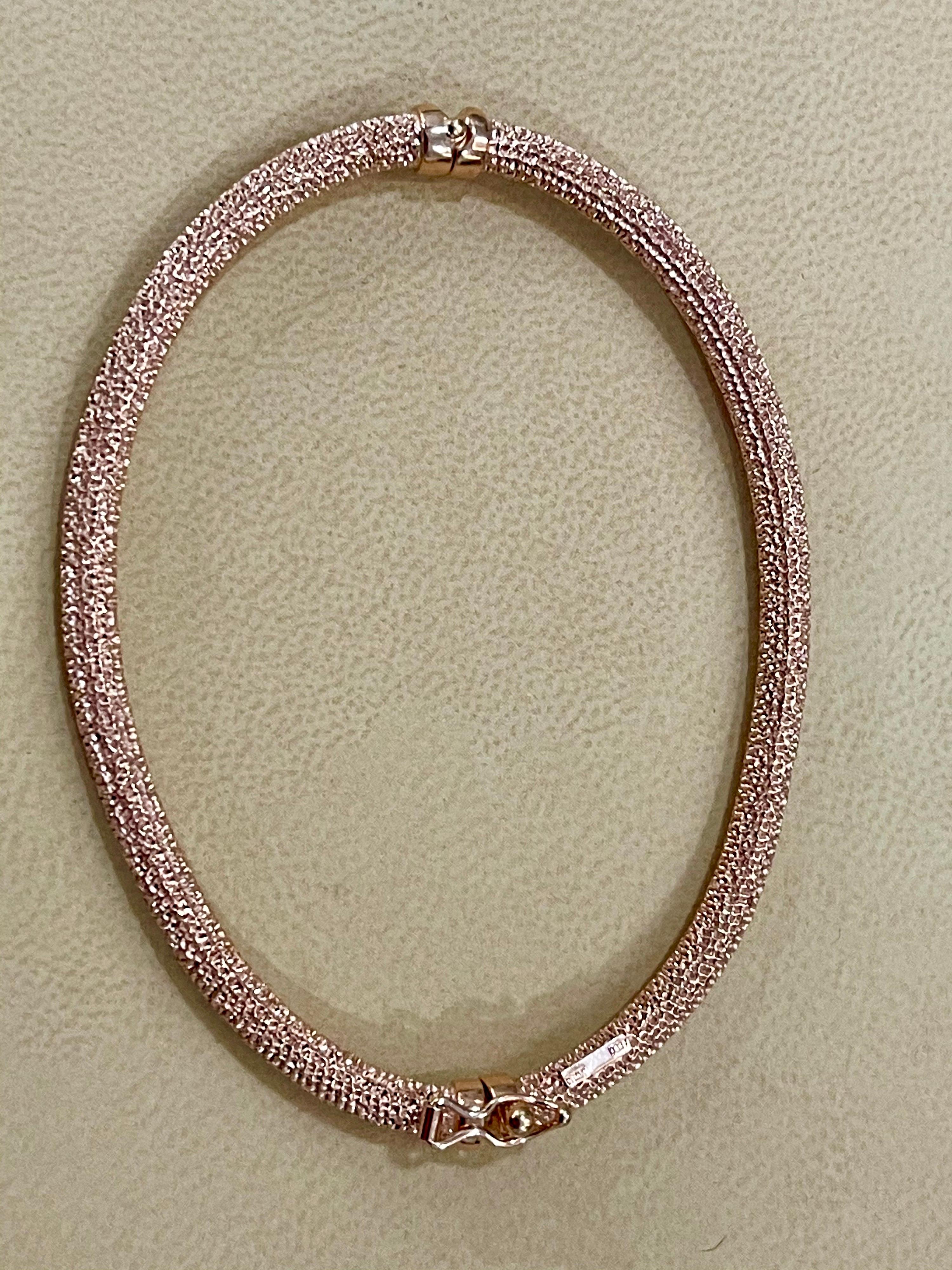 Pretty oval shape Rose gold Bangle 
The  pattern can be stacked with similar style bangles or worn as a stand-alone piece.
Bangel open from side for easy access
It fits a 6.5 to 7 inch wrist
14 K gold  5.3  gm 
Stamped 14 K and Italy

I did not take