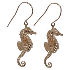 Boucles d'oreilles hippocampe en or rose 14 carats avec diamants