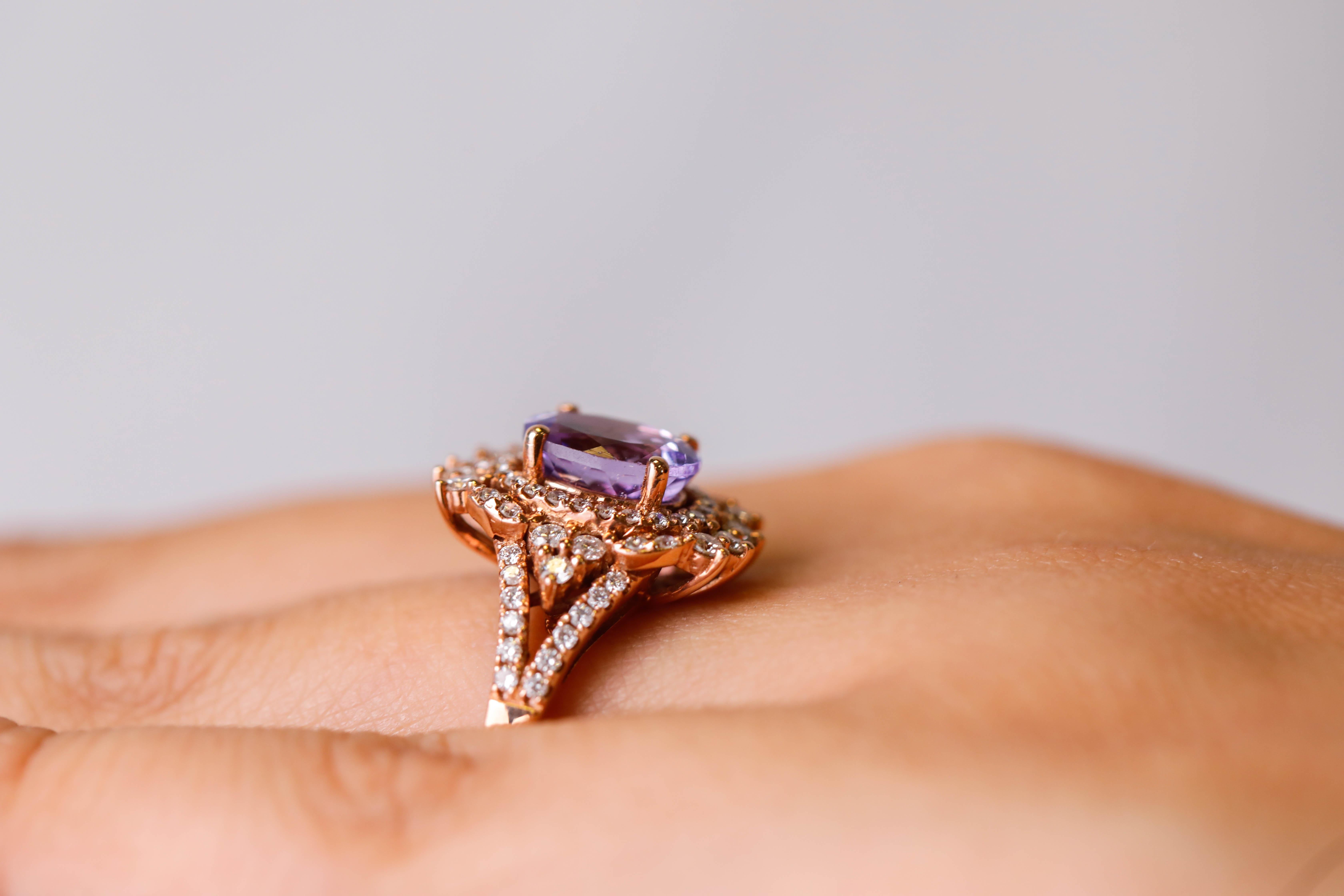Contemporary Oval Cut Pink Tanzanite Diamond Accent Engagement Ring in 14 karat Rose Gold