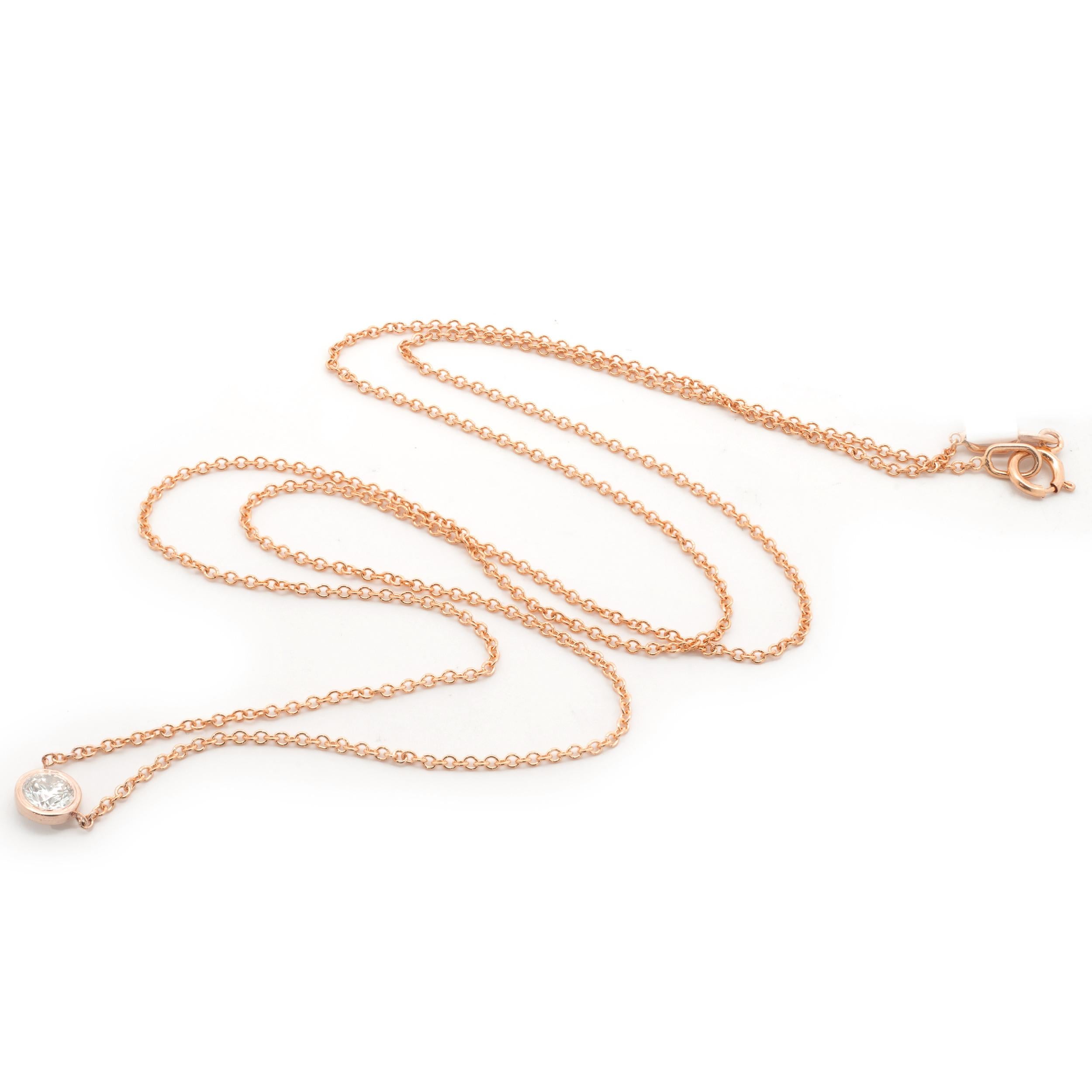 Designer: custom design
Material: 14K rose gold
Diamonds: 1 round brilliant cut = 0.17cttw
Color: G
Clarity: SI1
Dimensions: necklace measures 16-inches in length 
Weight: 1.37 grams
