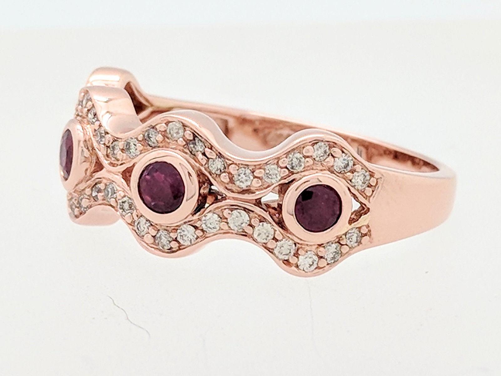 Contemporary 14 Karat Rose Gold Ruby and Diamond Right Hand Ring