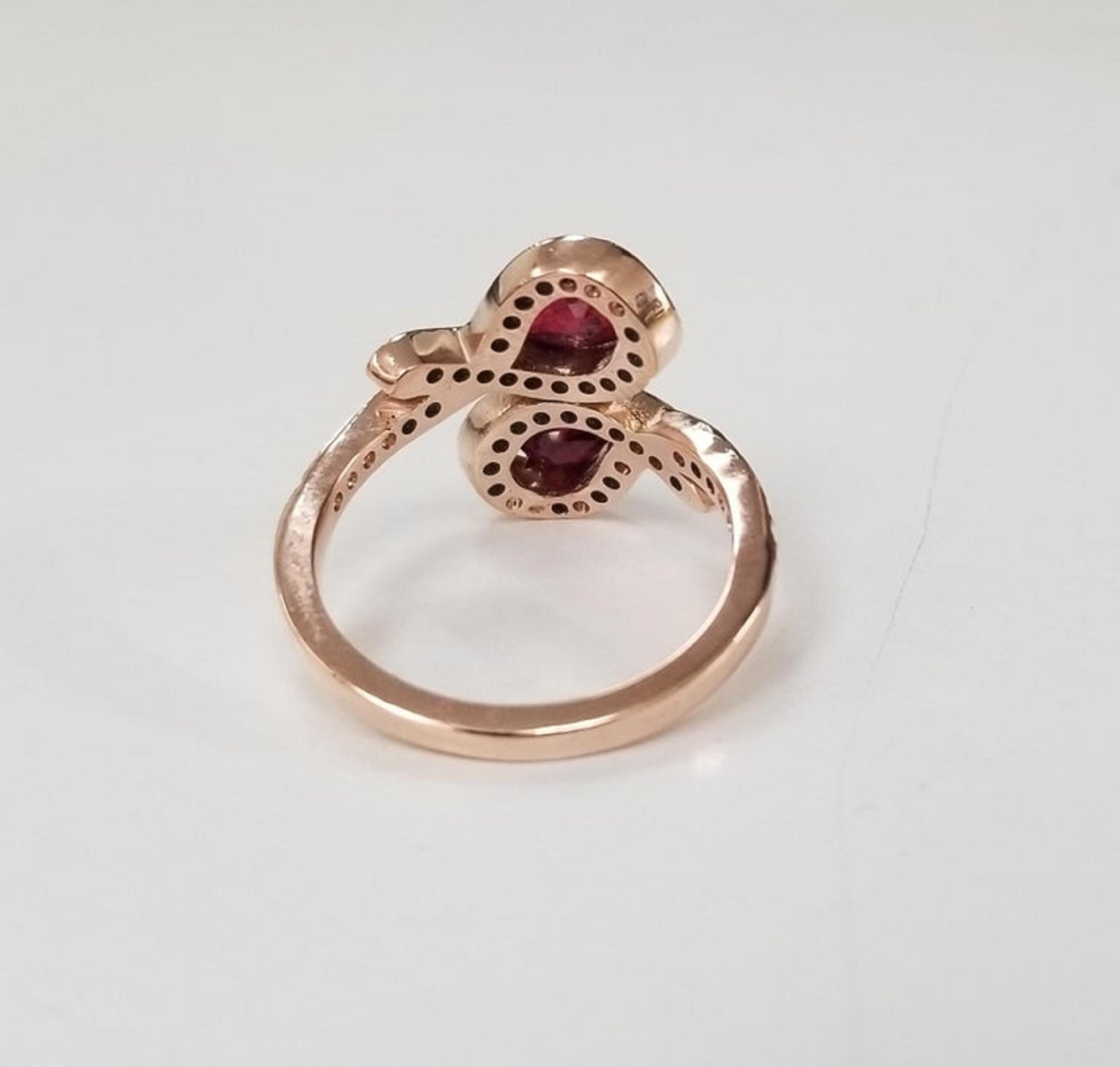 Contemporary 14 Karat Rose Gold Ruby and Diamond Ring 2 Pear Shape For Sale