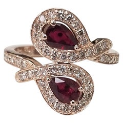 Ring aus 14 Karat Roségold mit Rubin und Diamant