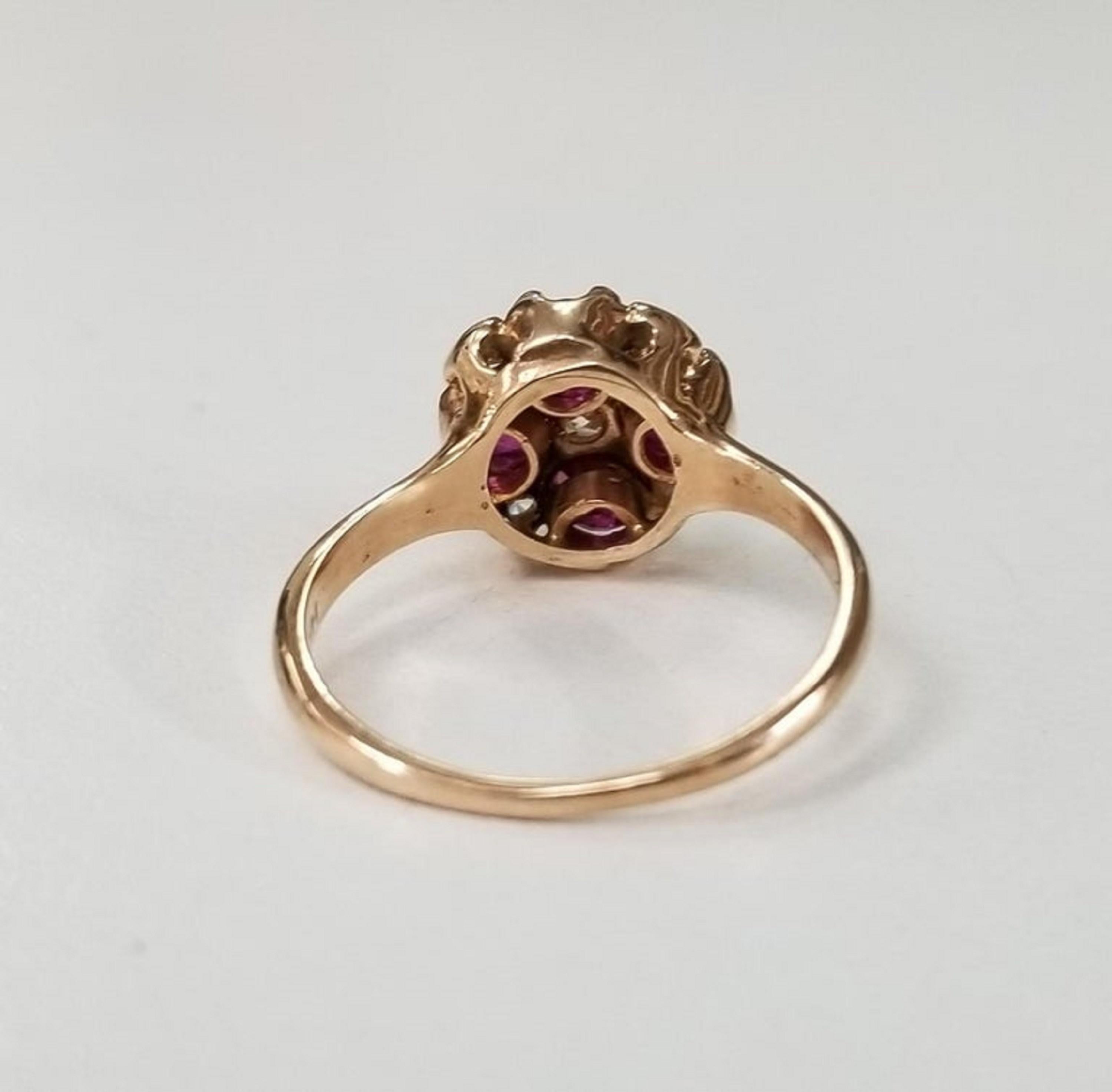 Round Cut 14 Karat Rose Gold Ruby and Diamond Ring 