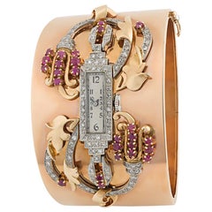 14 Karat Rose Gold, Ruby and Diamond Watch Bangle