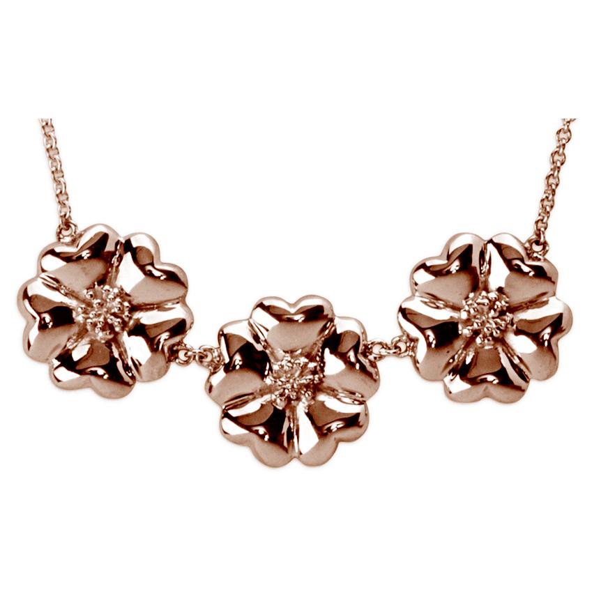 Designed in NYC

14k Rose Gold Vermeil 123 Small Blossom Necklace. The beauty of blossom delivered 3 times over in this simple, yet beautiful necklace. 123 small blossom necklace:  

	Sterling silver chain and blossoms in 14k rose gold