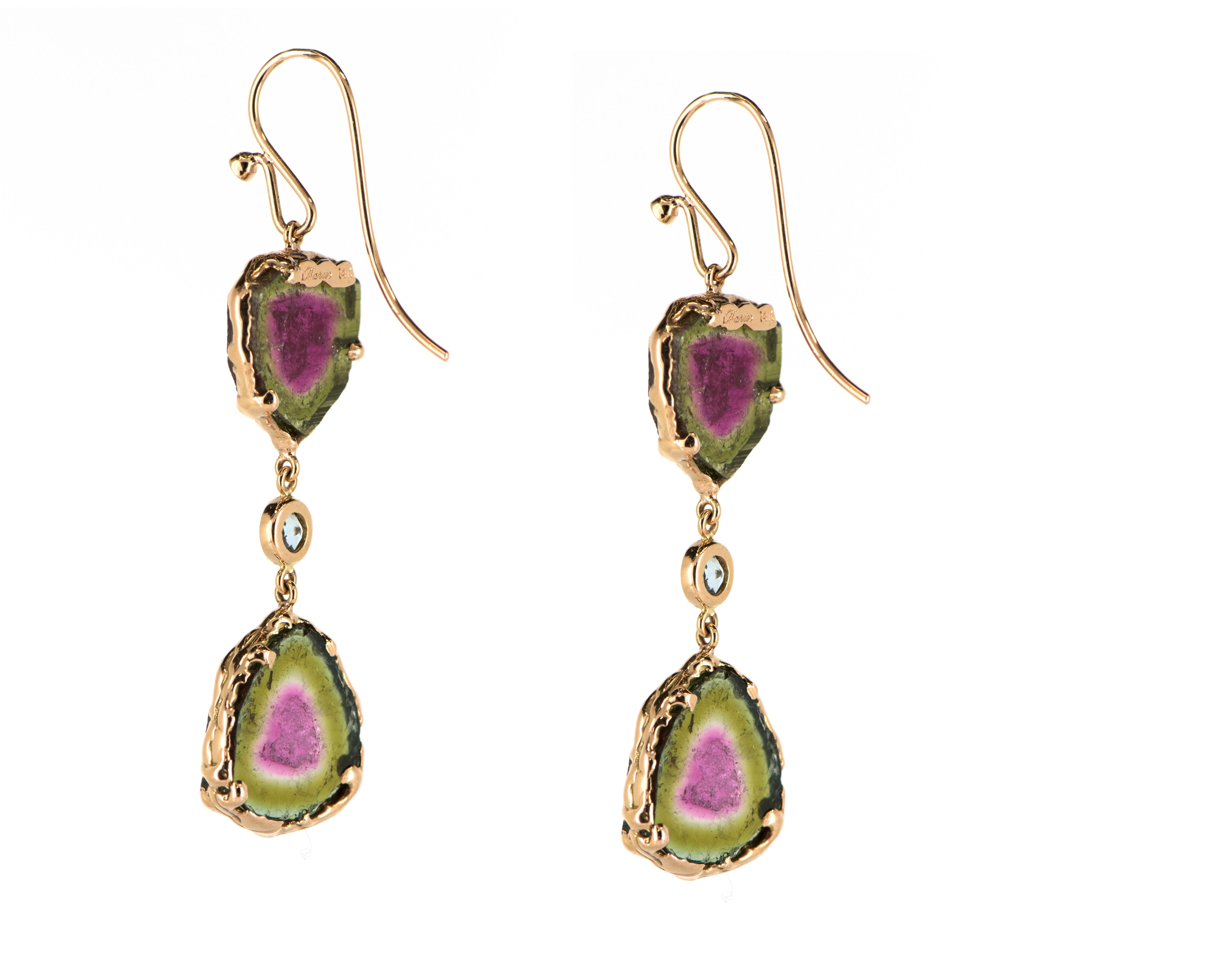 Introducing the stunning 14 Karat Rose Gold Watermelon Tourmaline Slice Dangle Earrings with Aquamarine accents. Named after its unique pink center framed in a green 