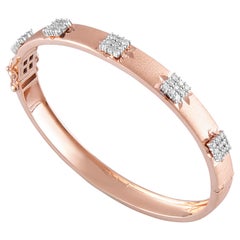 Bracelet jonc en or rose 14 carats avec diamants blancs