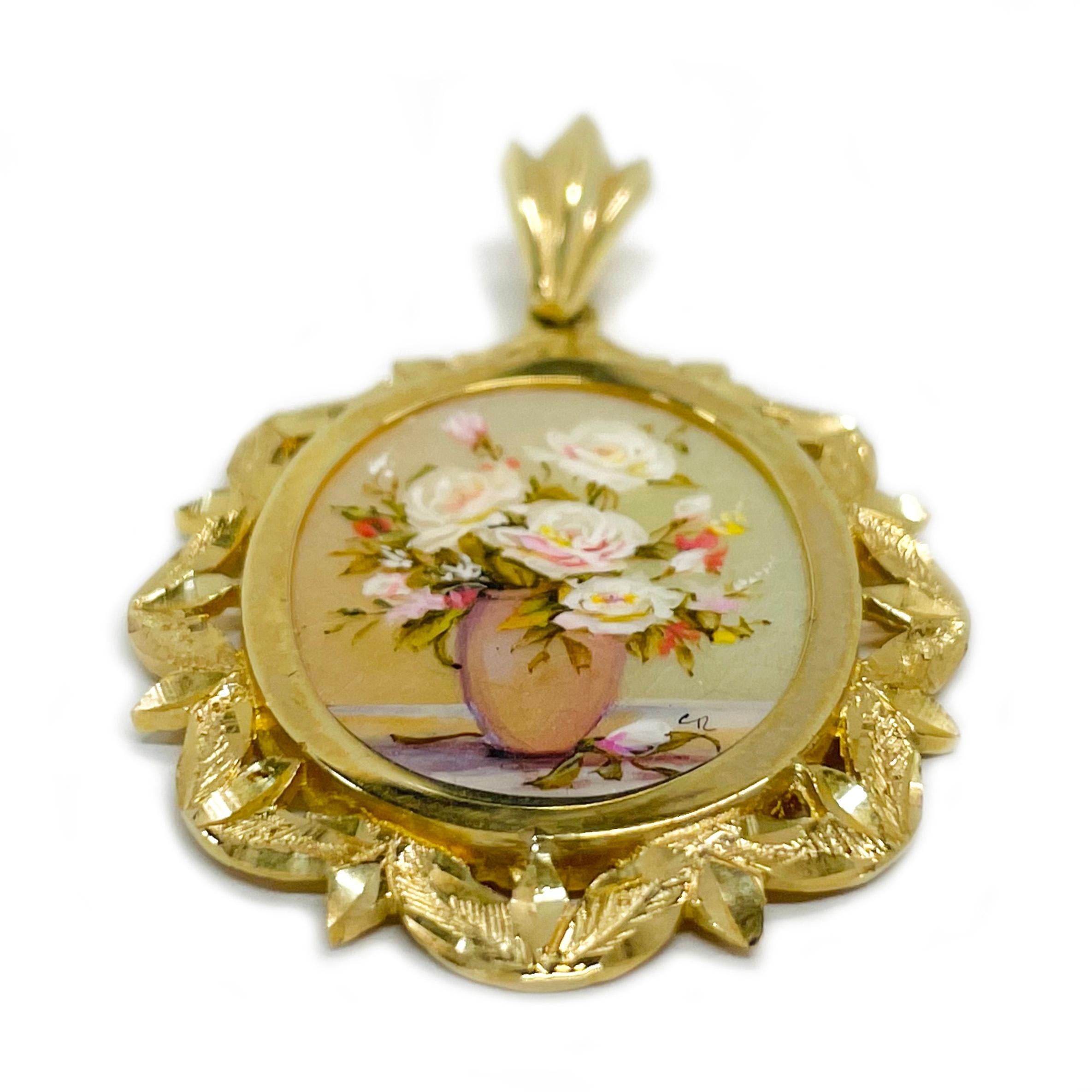 14 Karat Yellow Gold Rose Planter Hand Painted on a Mother of Pearl Pendant. The miniature painting is set in a 14 karat gold twisted rope oval frame with diamond-cut details. The painting is signed by the master artist, CR Charlotte. and includes a