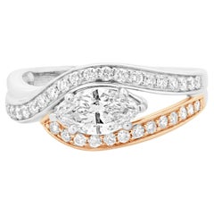 Anello di fidanzamento con diamante taglio marquise in oro rosa e bianco 14 carati