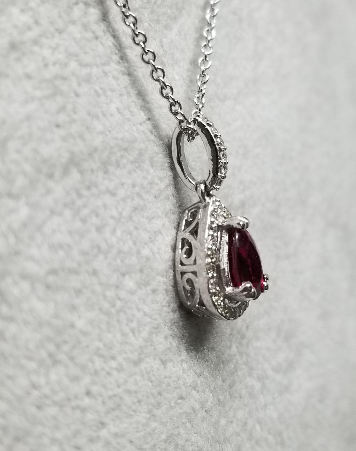 Contemporary 14 Karat Ruby and Diamond Halo Pendant For Sale