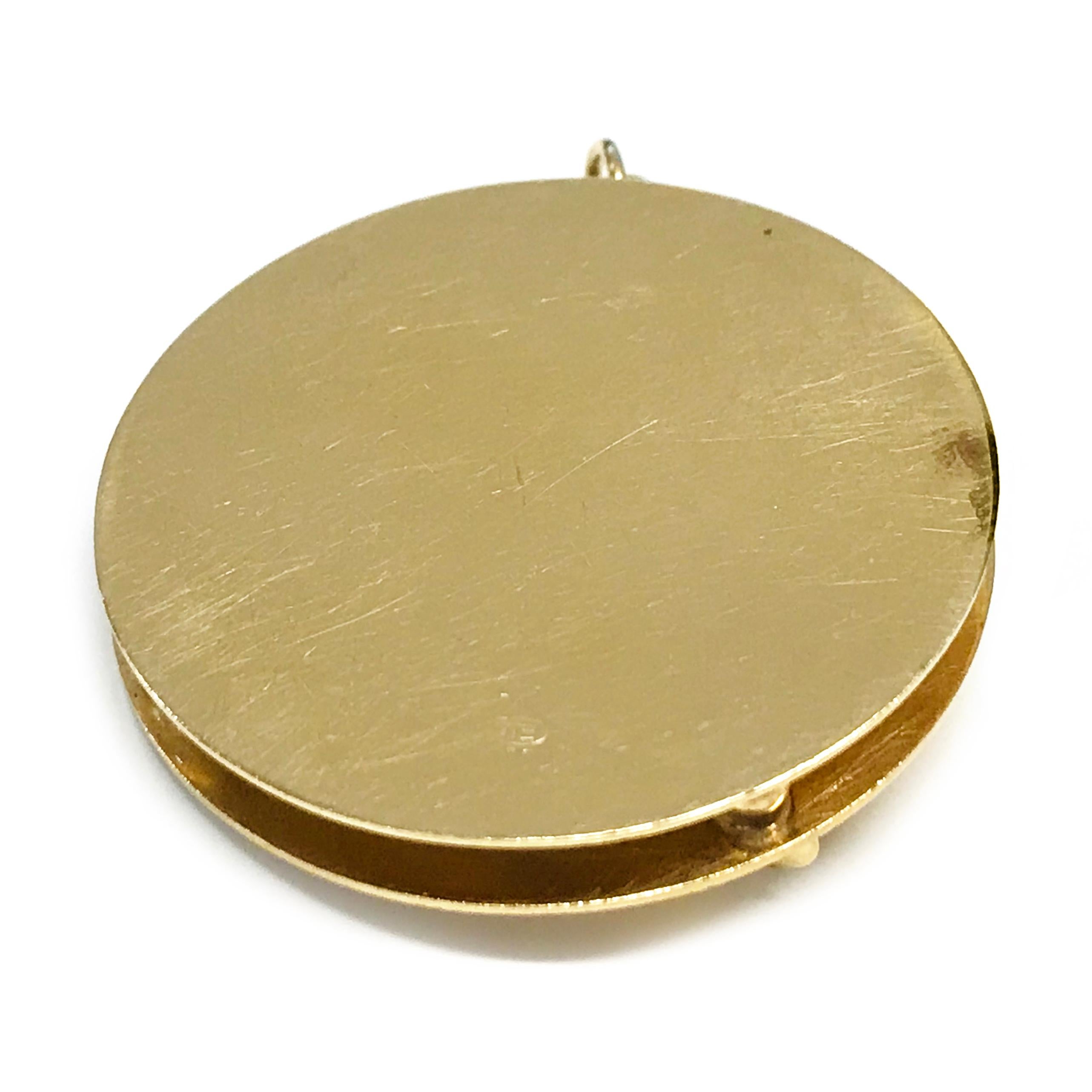 gold golf pendant