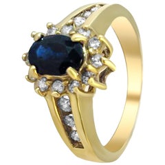 14 Karat Sapphire and Diamond Cluster Ring