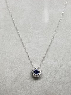 14 Karat Sapphire and Diamond Halo Pendant