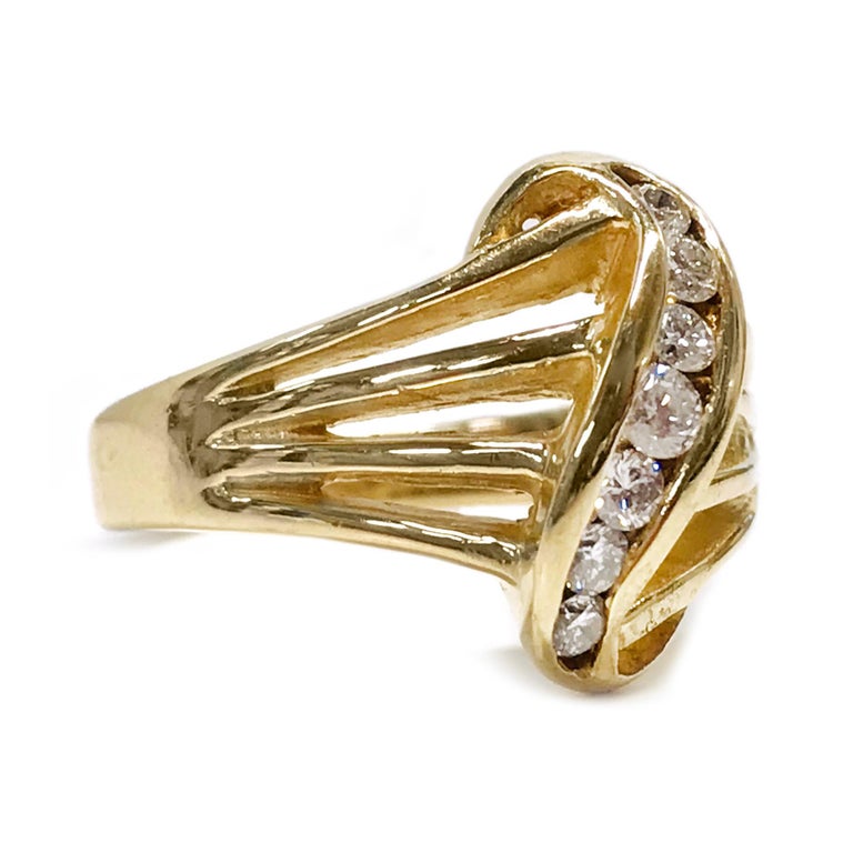 14 Karat Seven-Diamond Ring For Sale at 1stDibs