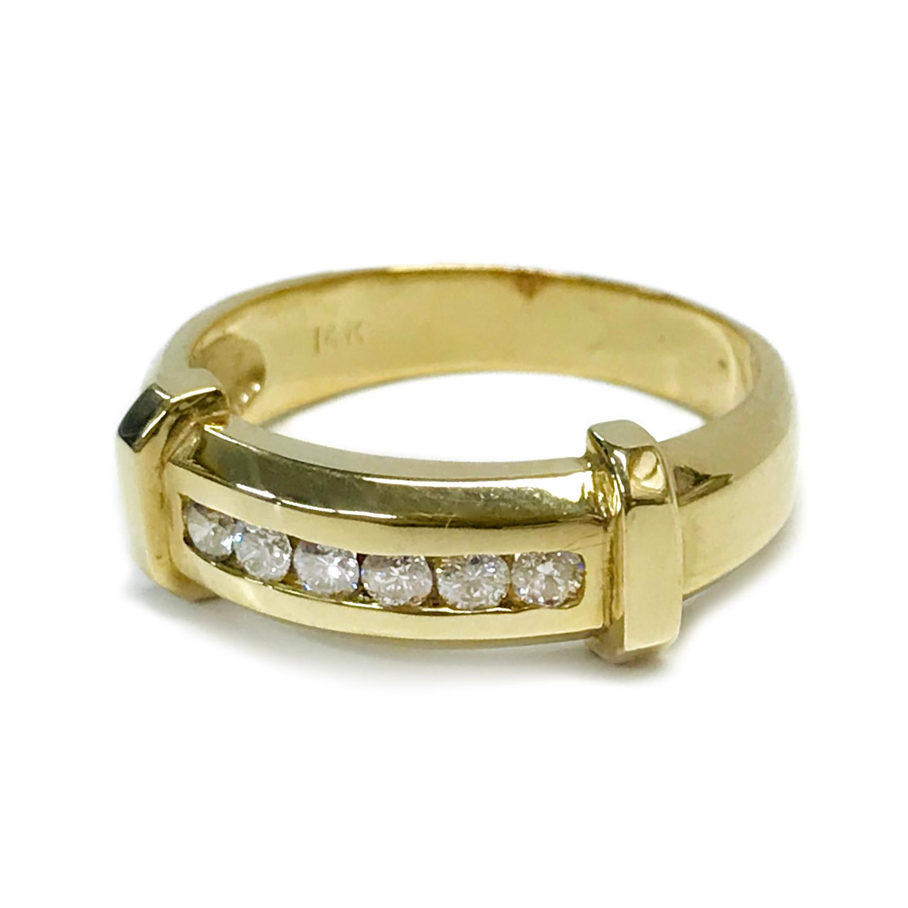 14 Karat Six Diamond Ring. The ring features six round channel-set diamonds horizontally-set at the center with one gold bar at the beginning of the first and the end of the last diamond. The six diamonds have a total carat weight of 0.36ctw.