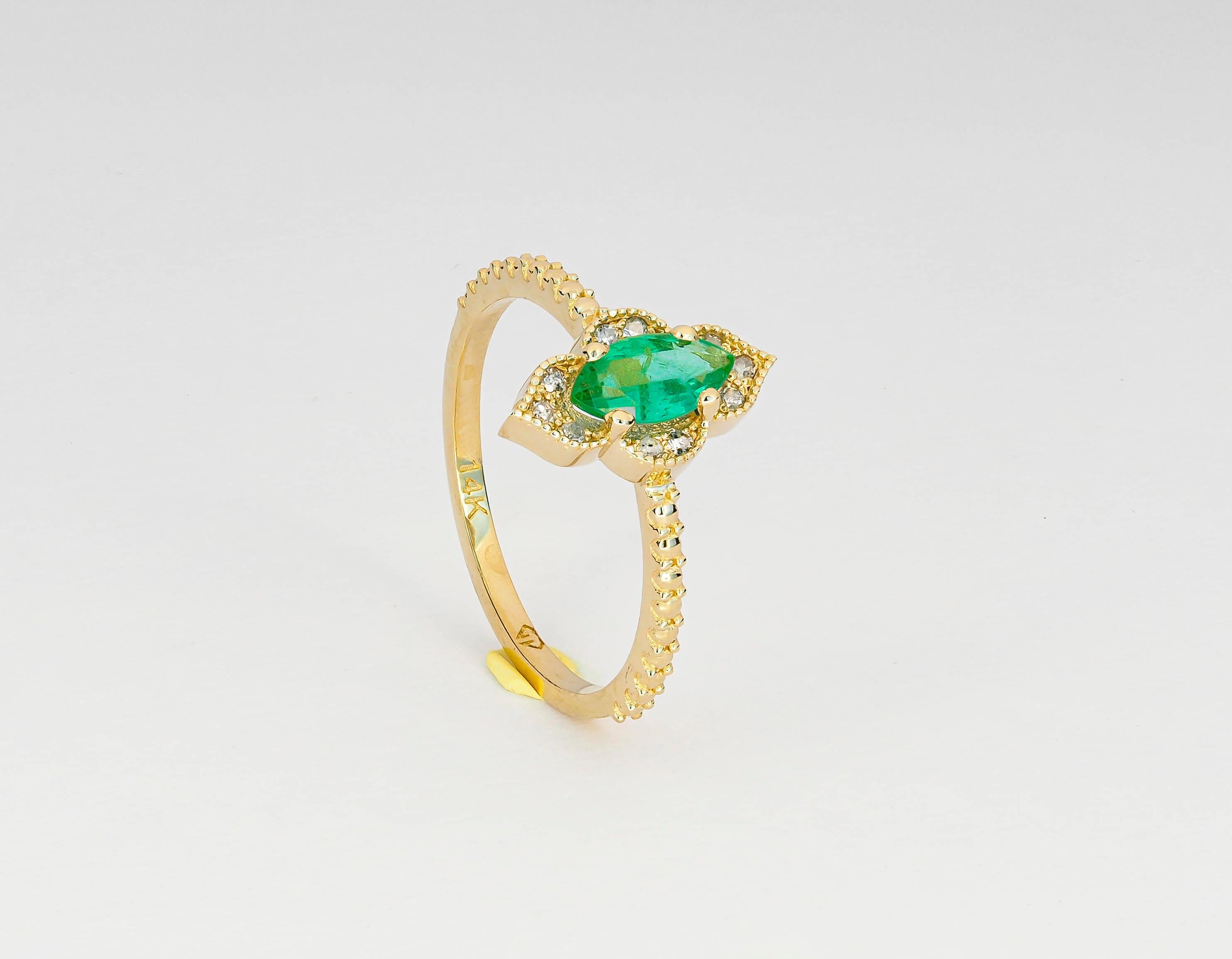 14 karat gold ring with natural emerald and diamonds. May birthstone emerald ring.
Weight approx. 2.02 g. depends from size
Central stones: Natural emerald
Marquise cut, weight - approx 0.70 ct in total.
Clarity: Transparent with inclusions, color -