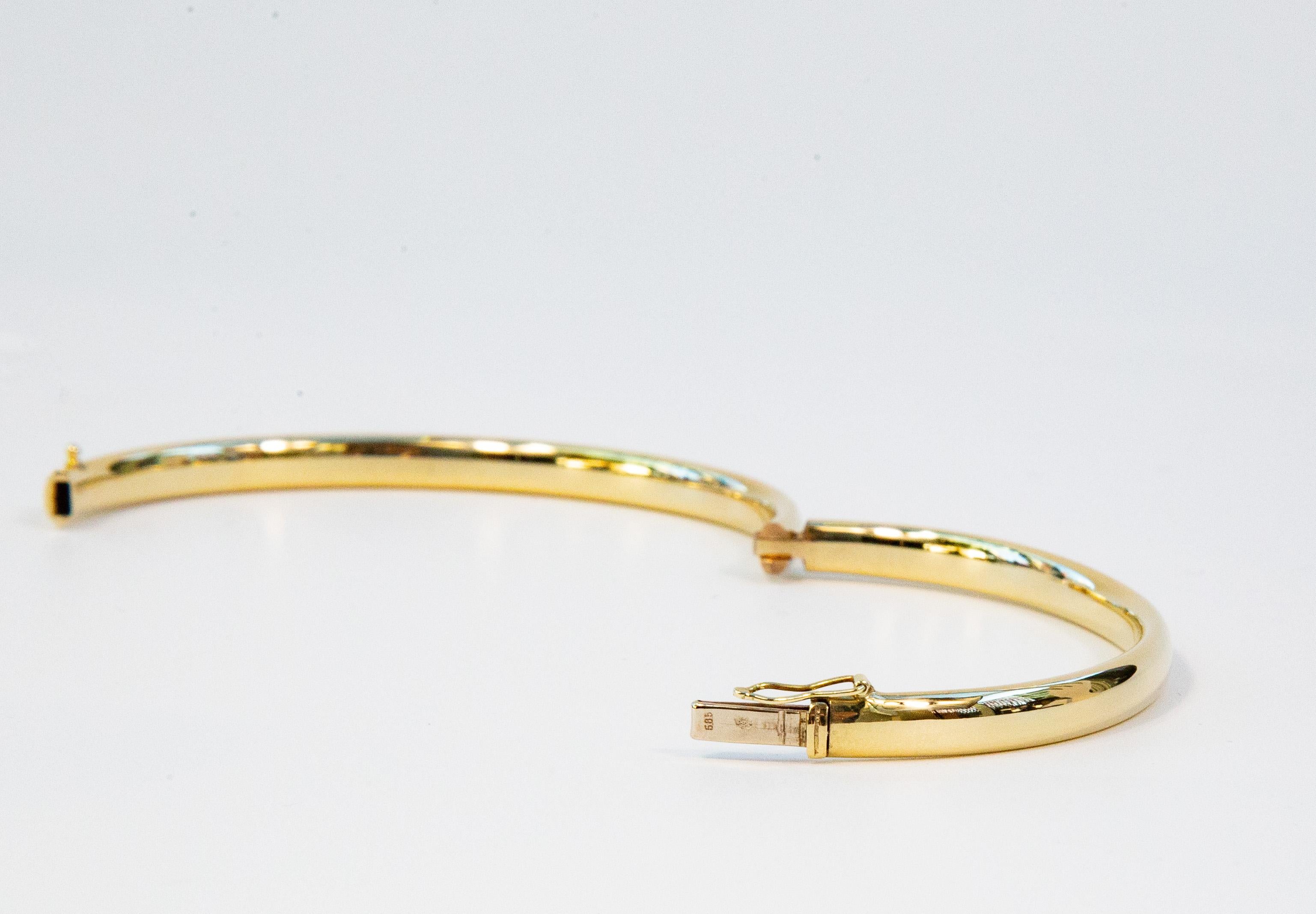 14 Karat Solid Yellow Gold Hinged Bangle Rigid Bracelet en venta 3