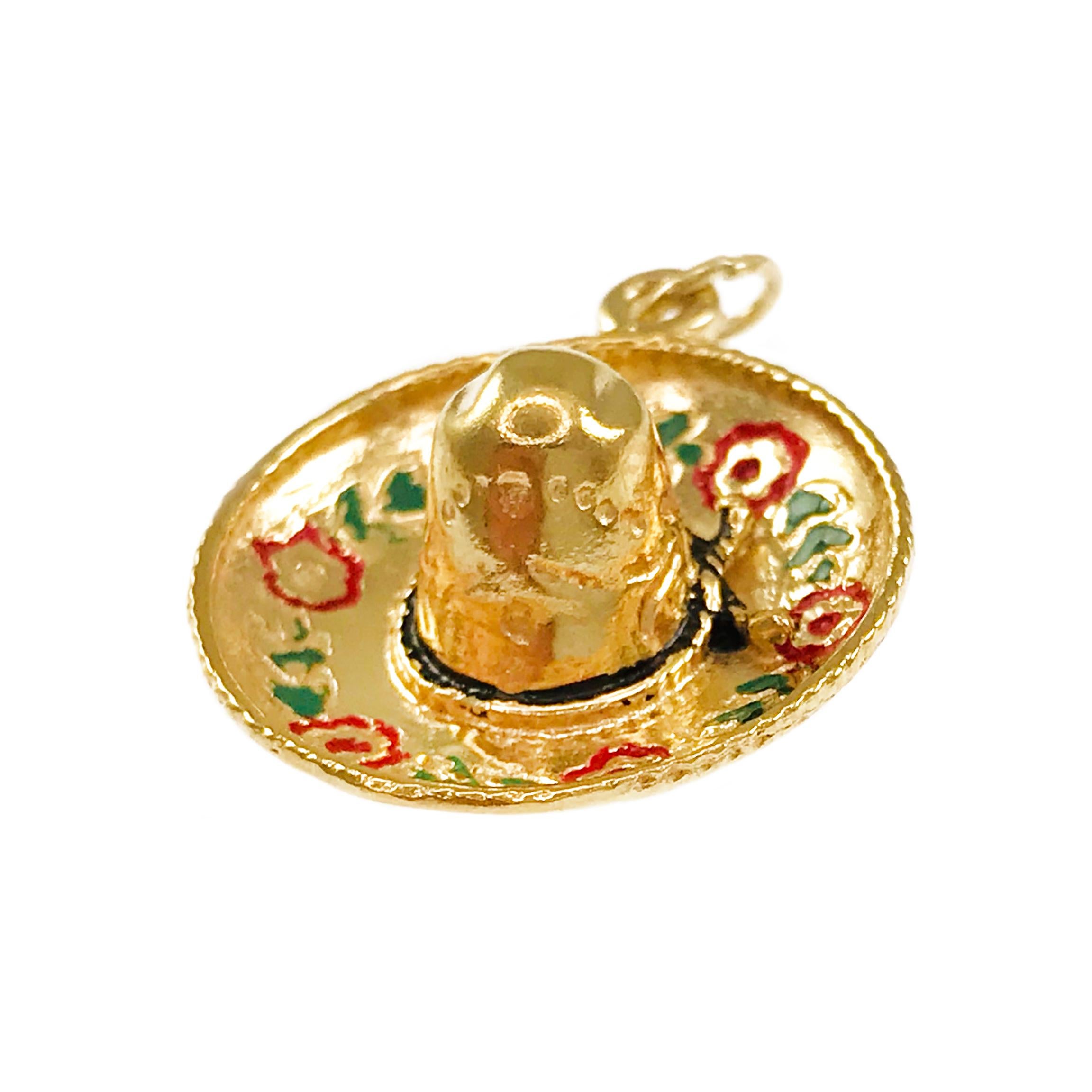 14 Karat Sombrero Pendant. This lovely sombrero pendant offers so much detail, there are flowers and leaves motif highlighted with red and green enamel respectively. The pendant measures 8.6mm wide x 24.7mm tall x 20.33mm long. Stamped on the back