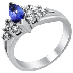 14 Karat Tanzanite and Diamond Cluster Ring
