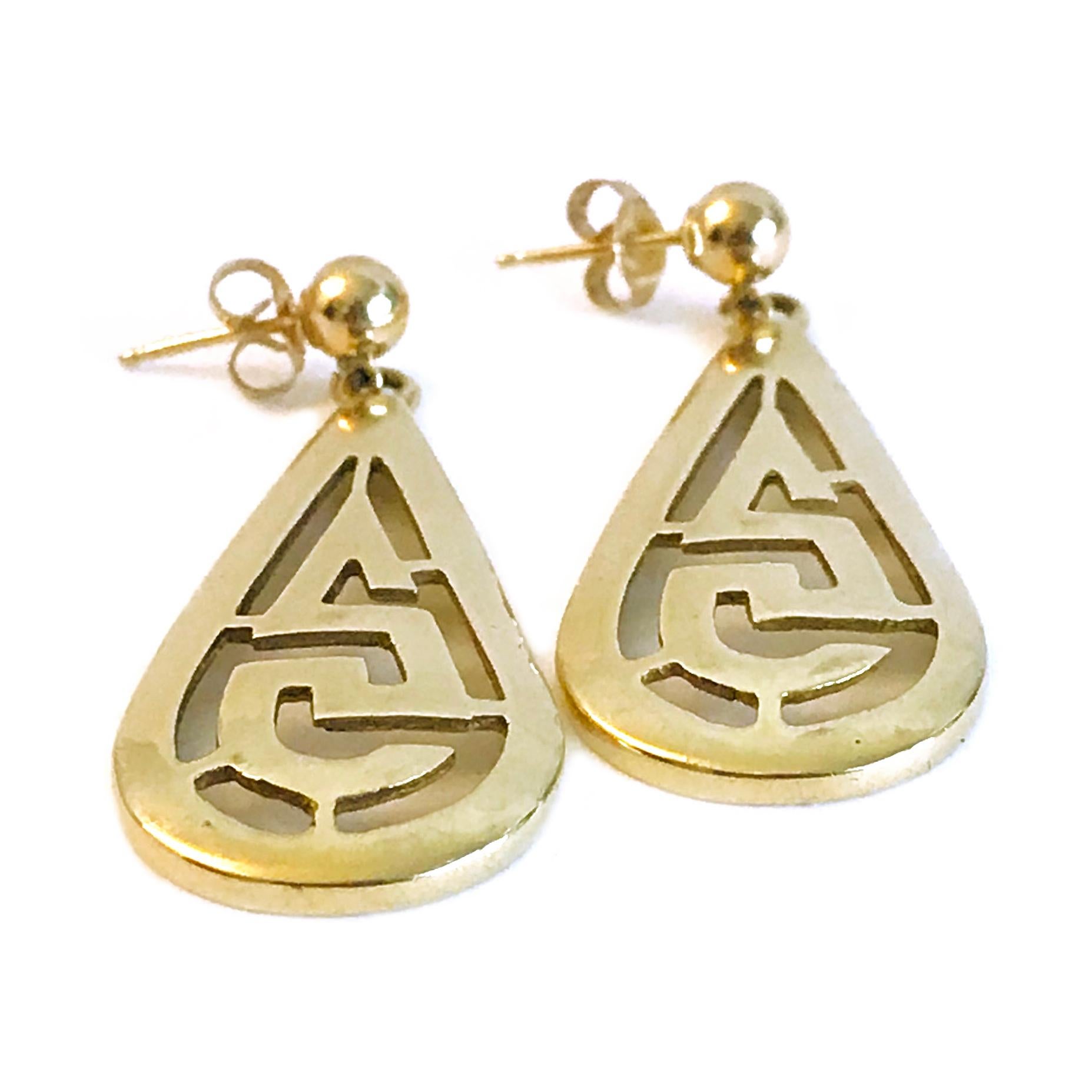 14 Karat Teardrop Earrings. These Greek-inspired earrings contain a gold bead stud with a teardrop. The earrings have a push back and 585 stamped on the back. The earrings measure 41mm high x 17mm wide. The total gold weight of the earrings is 8.36
