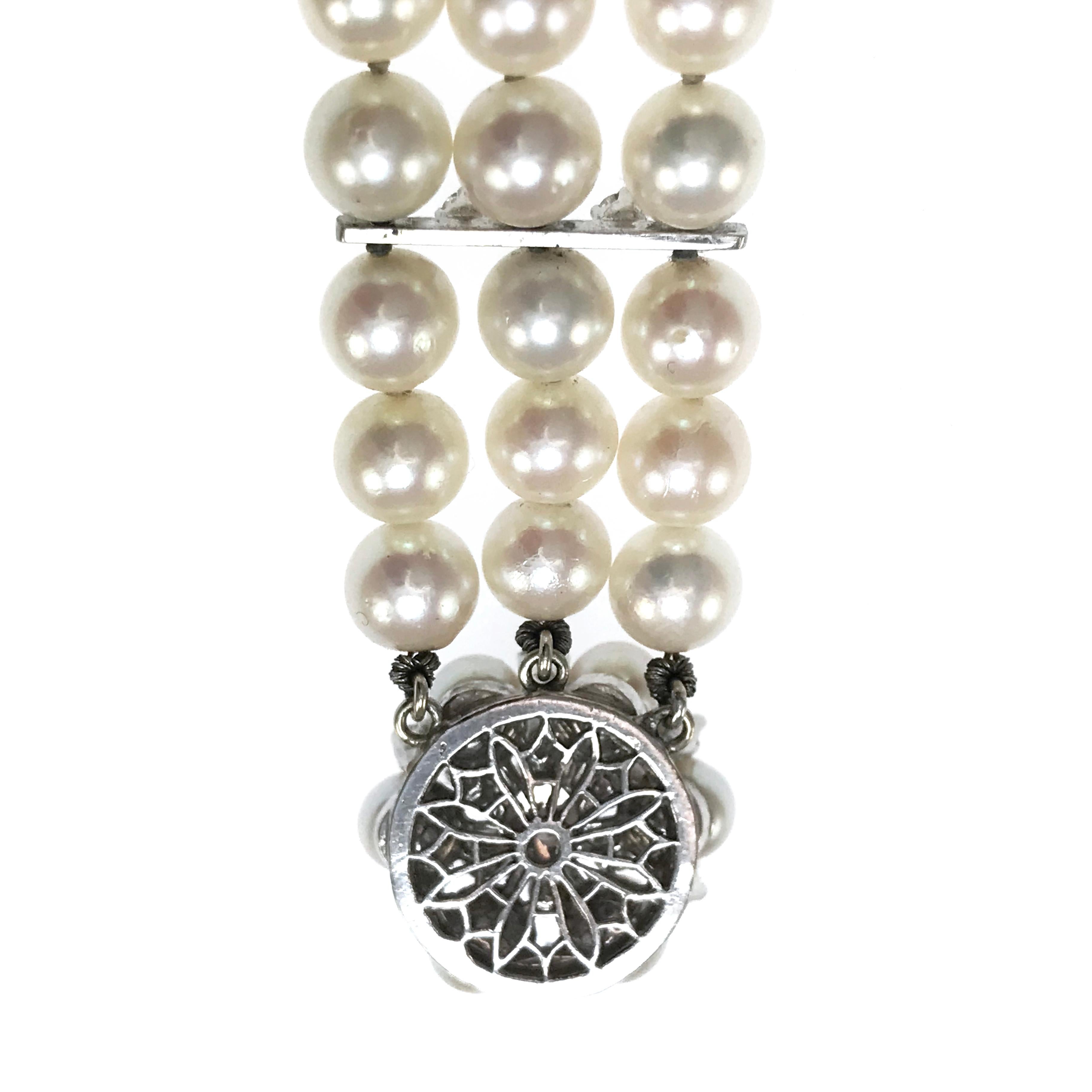 14 Karat Dreireihiges Perlen-Diamant-Armband (Rundschliff) im Angebot