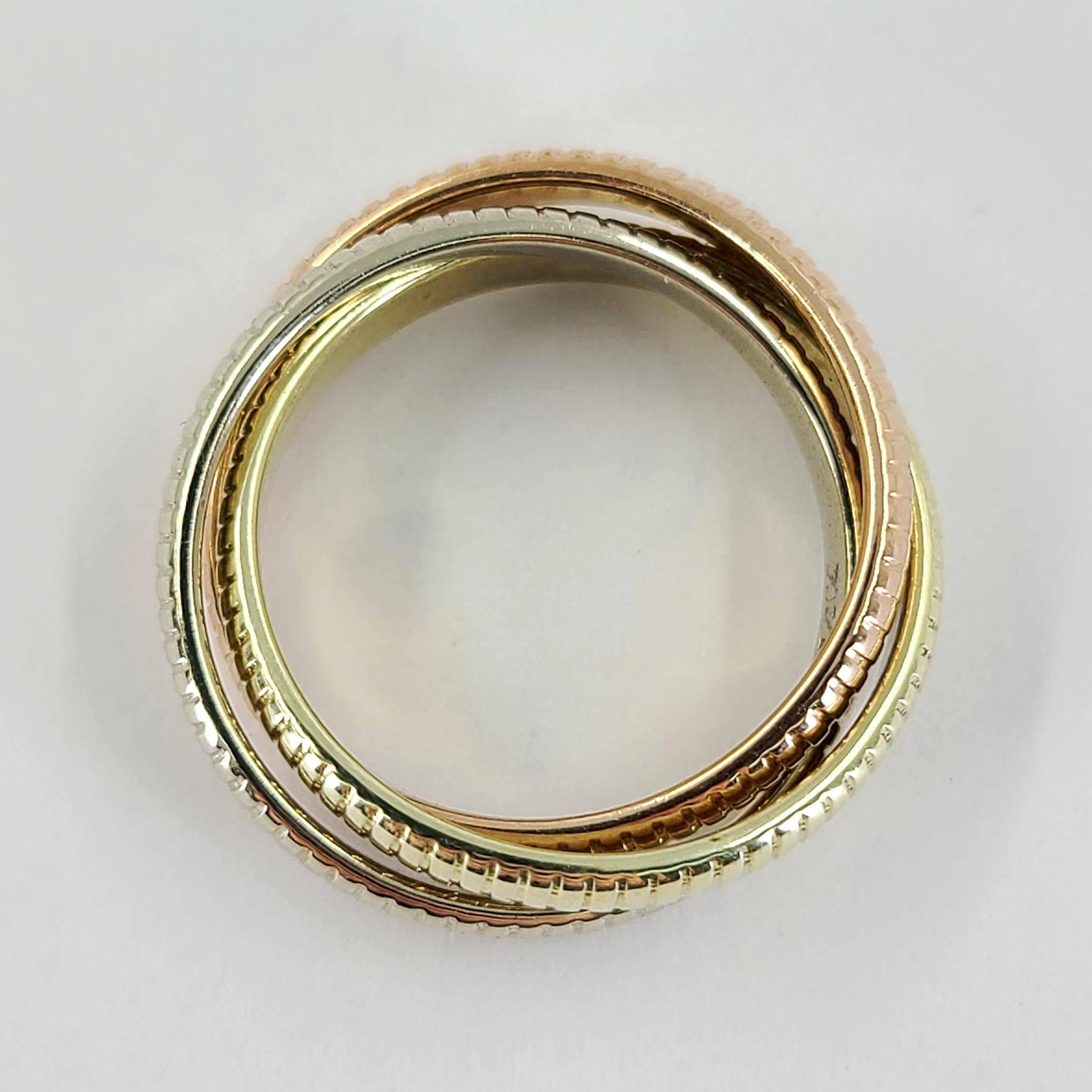 14 Karat Tricolor Gold Rolling Ring Featuring Ridged Texture In Rose, Yellow, & White Gold. Finger Size 3.5; Makes A Great Pinky Ring! Finished Weight Is 5.4 Grams. Cannot Be Sized.