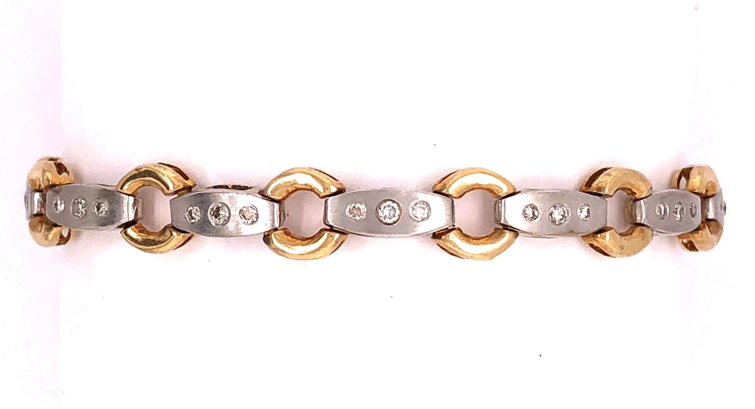 14 Karat Two Tone 7.5 Inch Fancy Link Bracelet .
Poids : 15,6 grammes 
Poids total des diamants : 0,40ct


