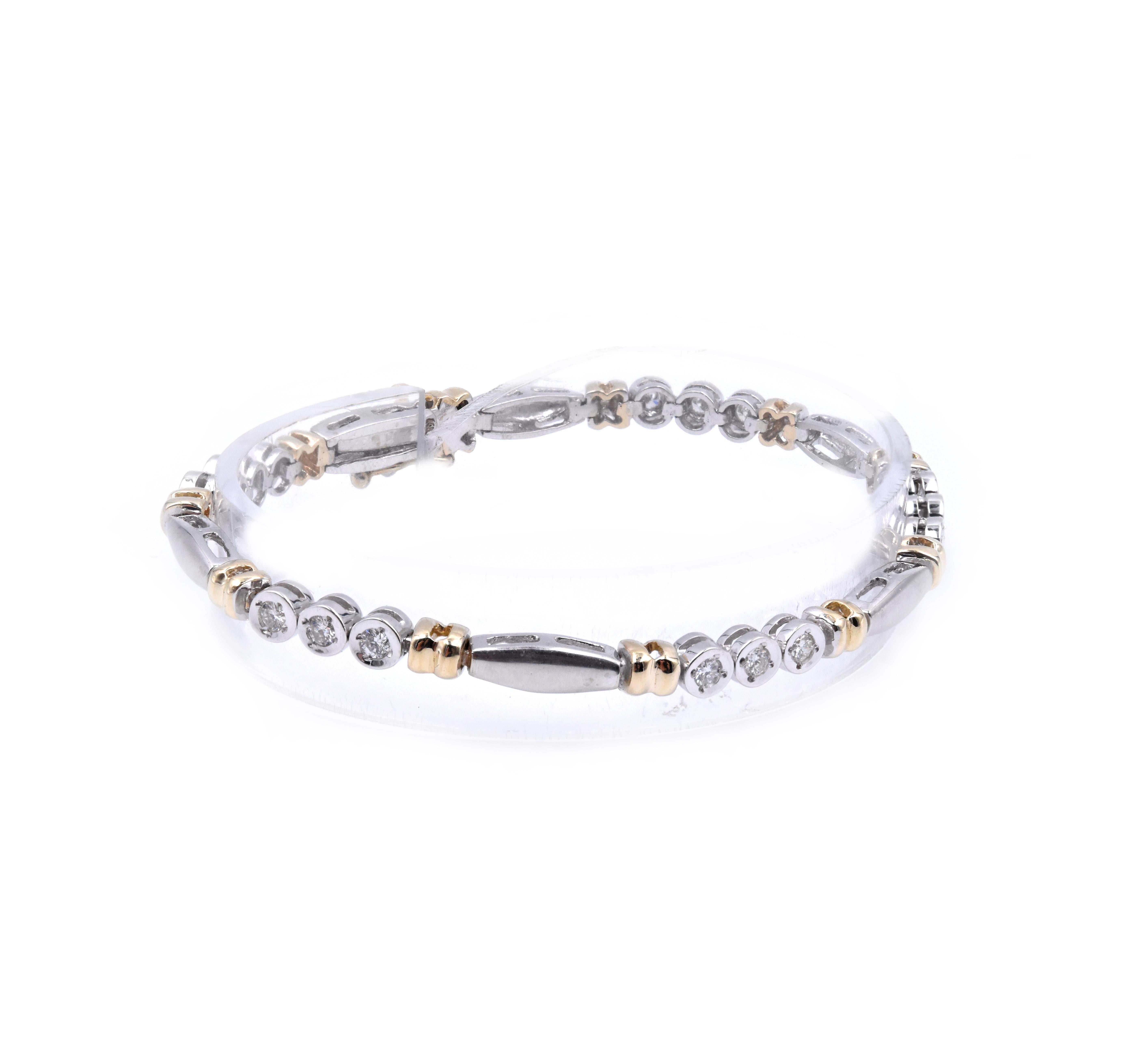 Material: 14K white and yellow gold
Diamonds: 15 round brilliant cut = .75cttw
Color: H
Clarity: SI1
Dimensions: bracelet will fit up to a 7-inch wrist
Weight: 13.06 grams
